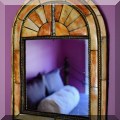 DM05. Arched mirror with mosaic-style frame. 